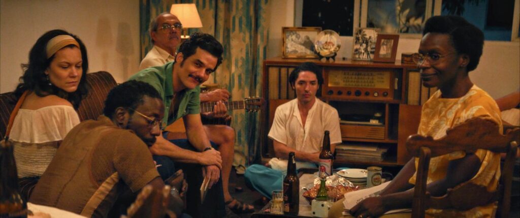 Wagner Moura's character in "The Secret Agent" shelters with political refugees and becomes a target for both state forces and hired assassins. - The Latino Slant