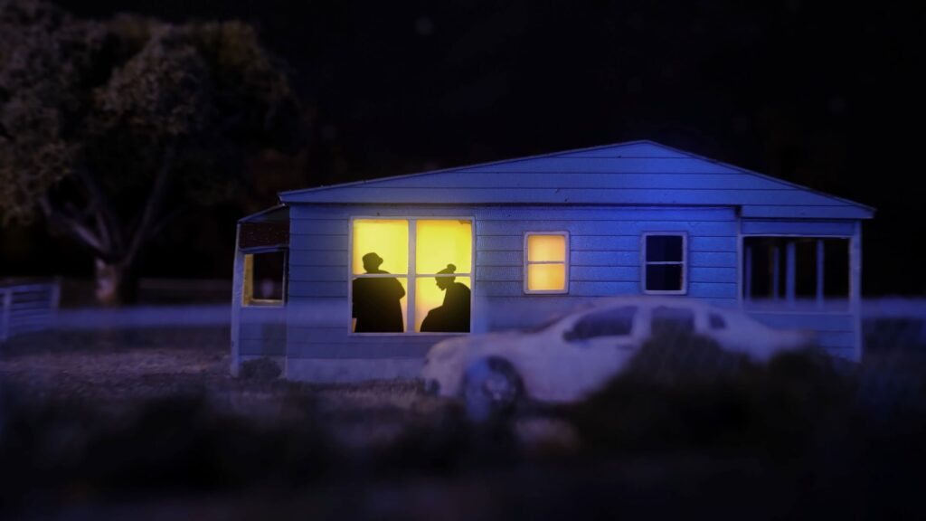 Miniature sets and figurines are used to recreate the director's  childhood home and even entire towns. - The Latino Slant