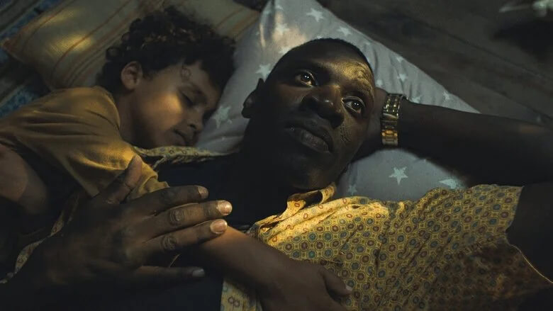 "I Was a Stranger" is heavy and somber; the emotional weight lingers long after the credits roll. - The Latino Slant