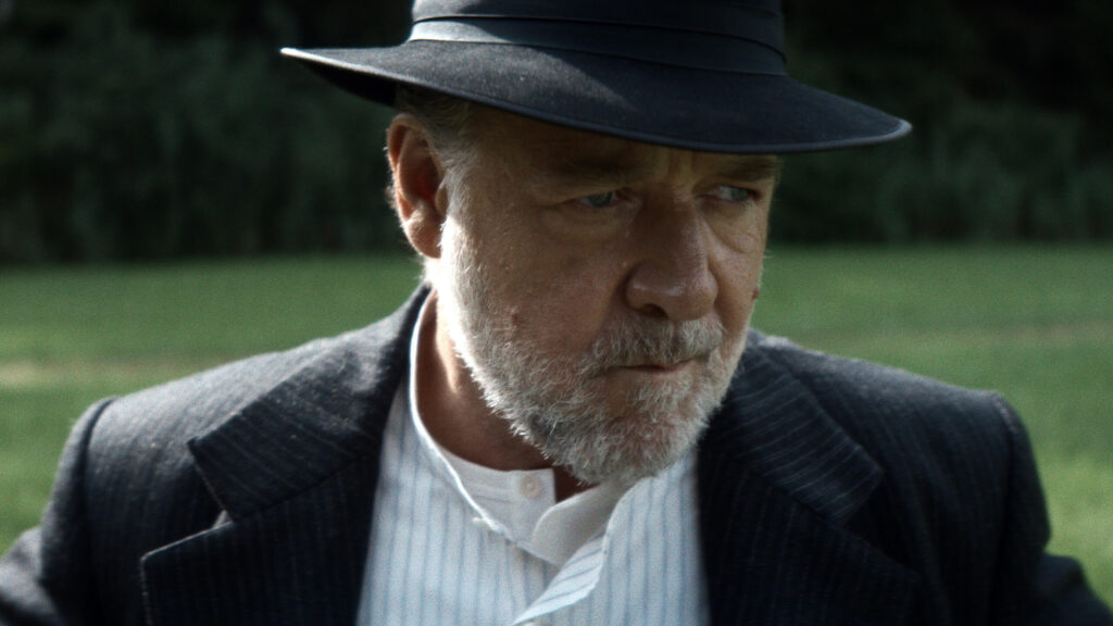 Russell Crowe plays Clancy, the warden of a brutal work camp. - The Latino Slant