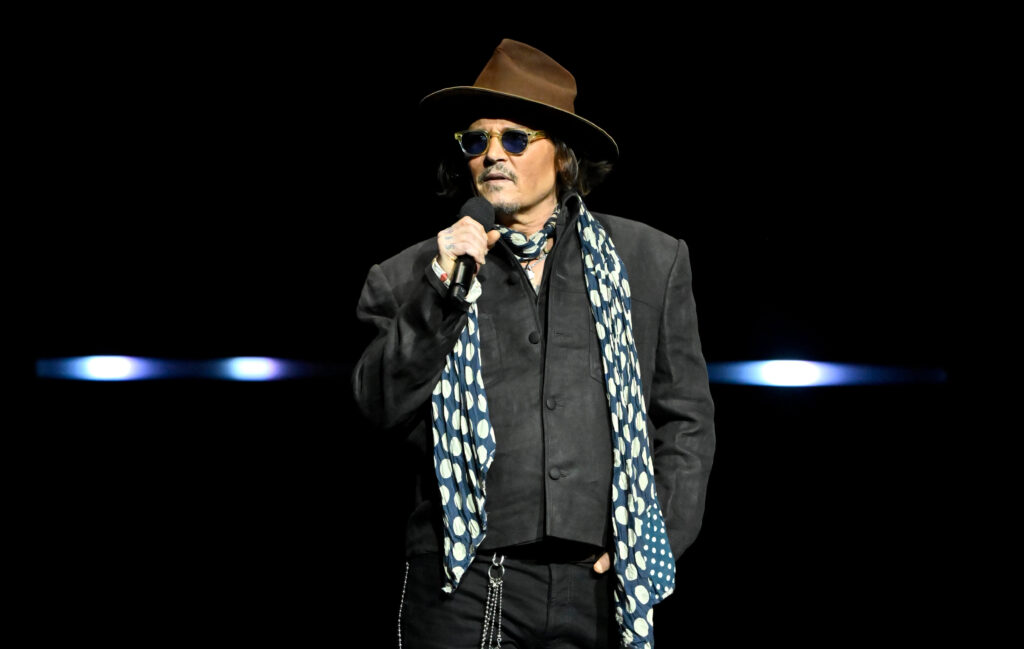 Johnny Depp received a standing ovation when he took the stage to discuss his role in Ti West's upcoming "Ebenezer: A Christmas Carol." - The Latino Slant