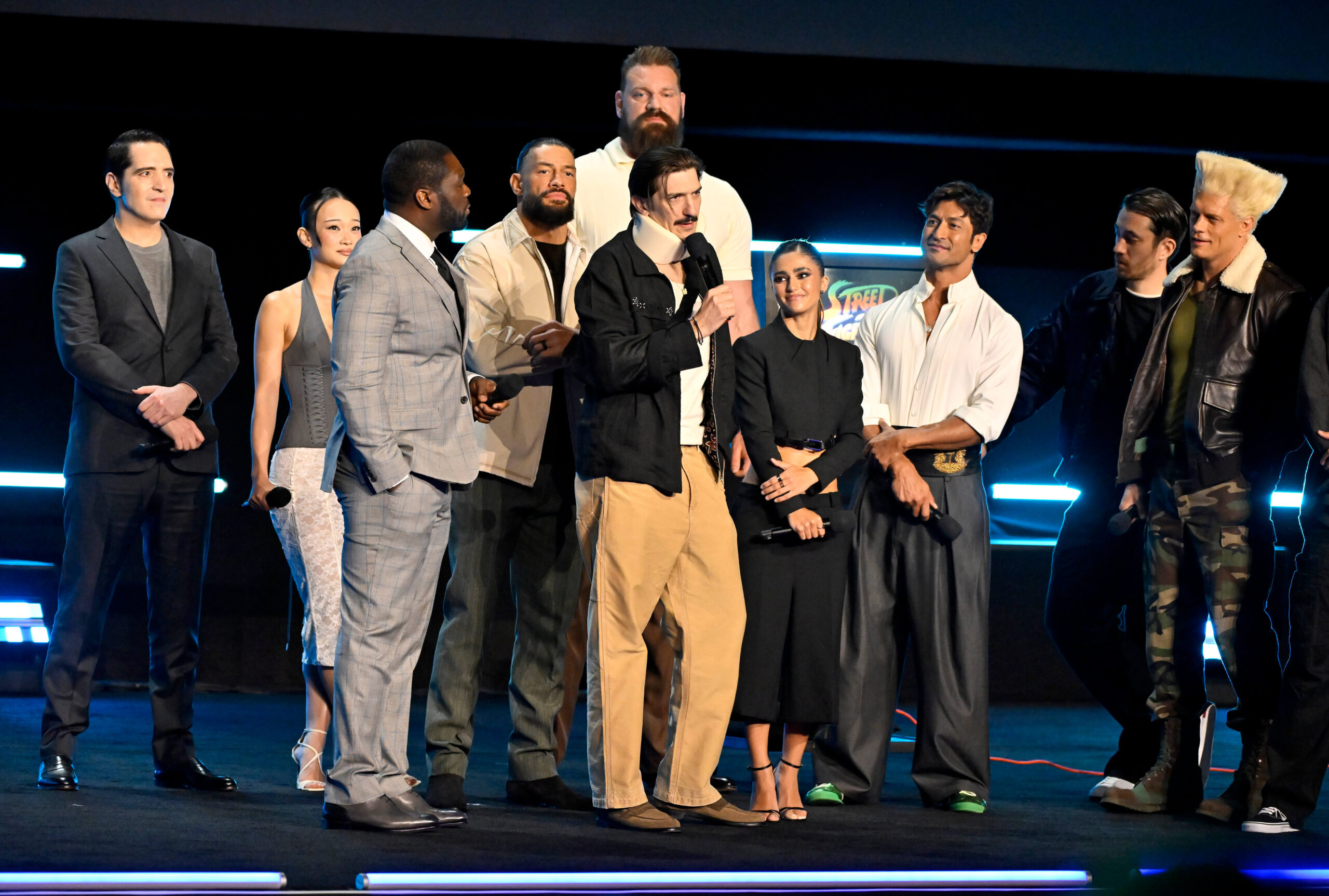 The cast of "Street Fighter" gathered on stage to watch a new trailer for the film. - The Latino Slant