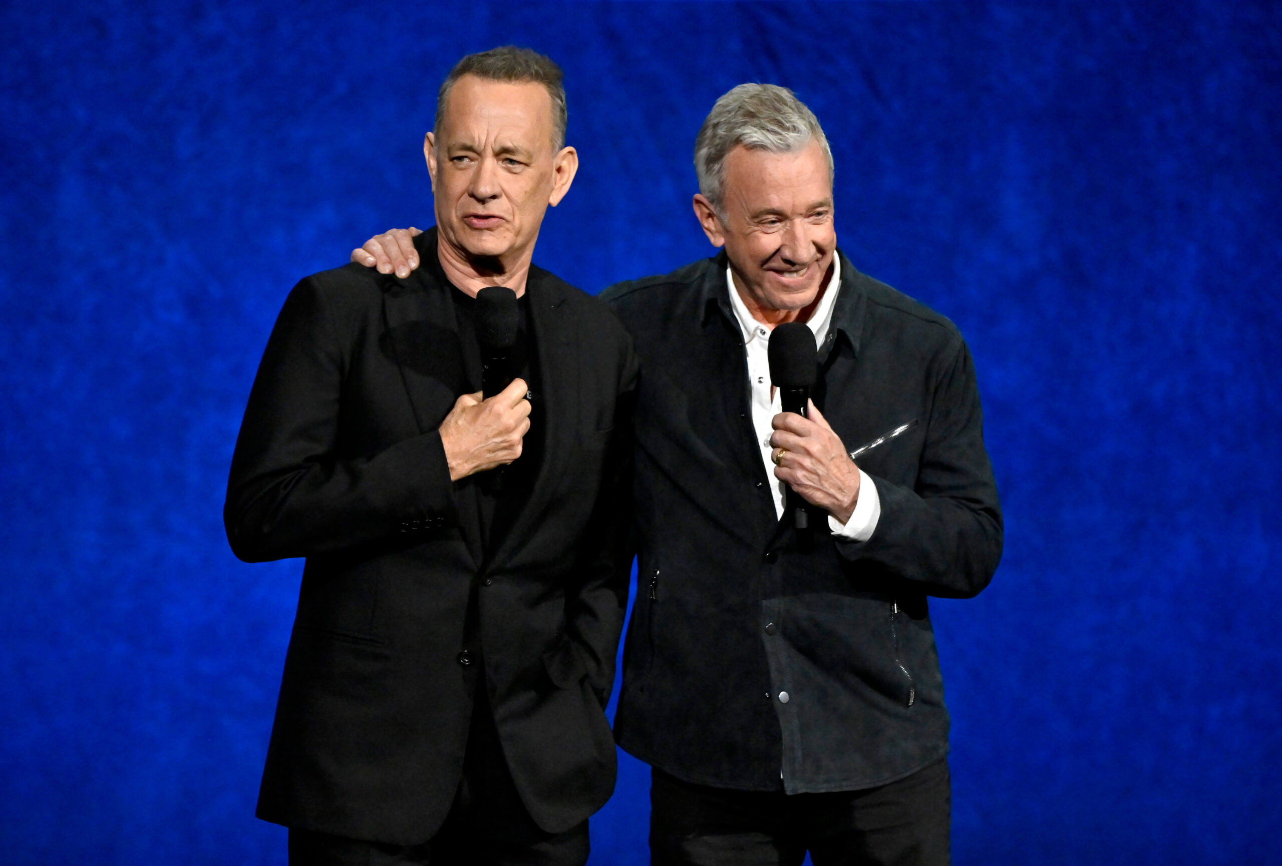 Tom Hanks and Tim Allen take the stage to talk about "Toy Story 5." - The Latino Slant