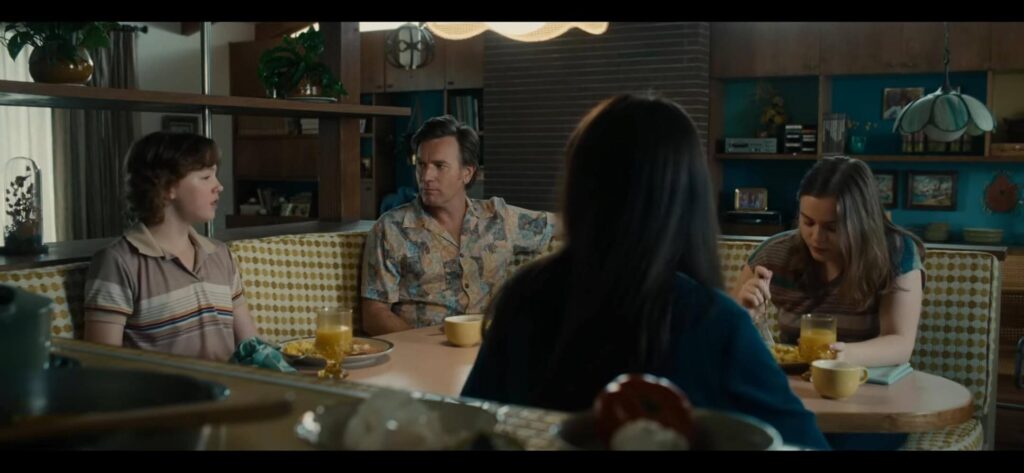 Ewan McGregor (Greg Platt), Christian Convery (Brian Platt), Maisy Stella (Audrey Platt), and Anne Hathaway (Denise Platt) as the Platt family, right before their world gets upended. - The Latino Slant