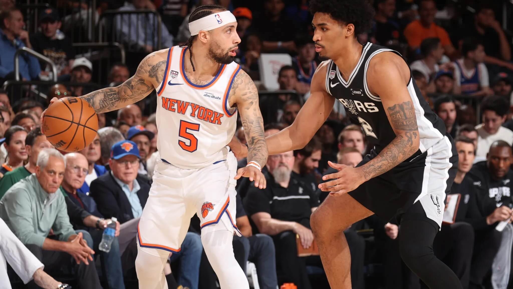 Alvarado drives past a Spurs defender in a recent matchup. - The Latino Slant
