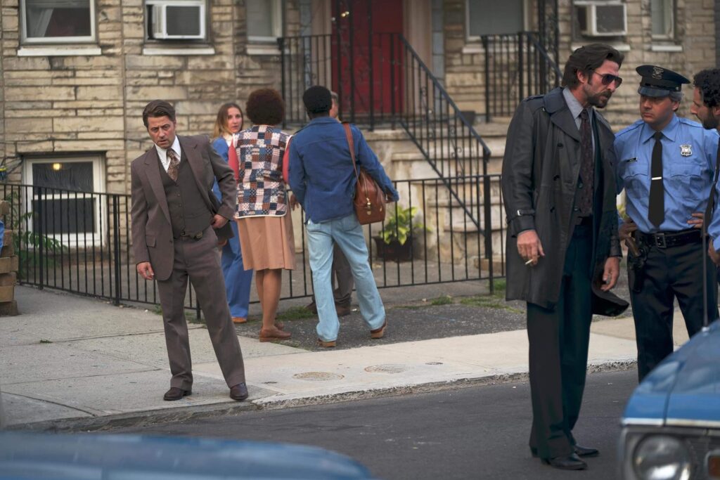 Two detectives on a Detroit street in "Motor City." - The Latino Slant