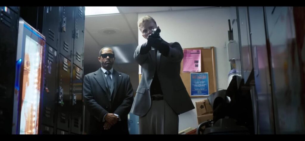Government men close in on the situation in "Onslaught." - The Latino Slant