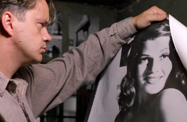 Andy Dufresne hangs a poster of Rita in "The Shawshank Redemption" (1994). - The Latino Slant